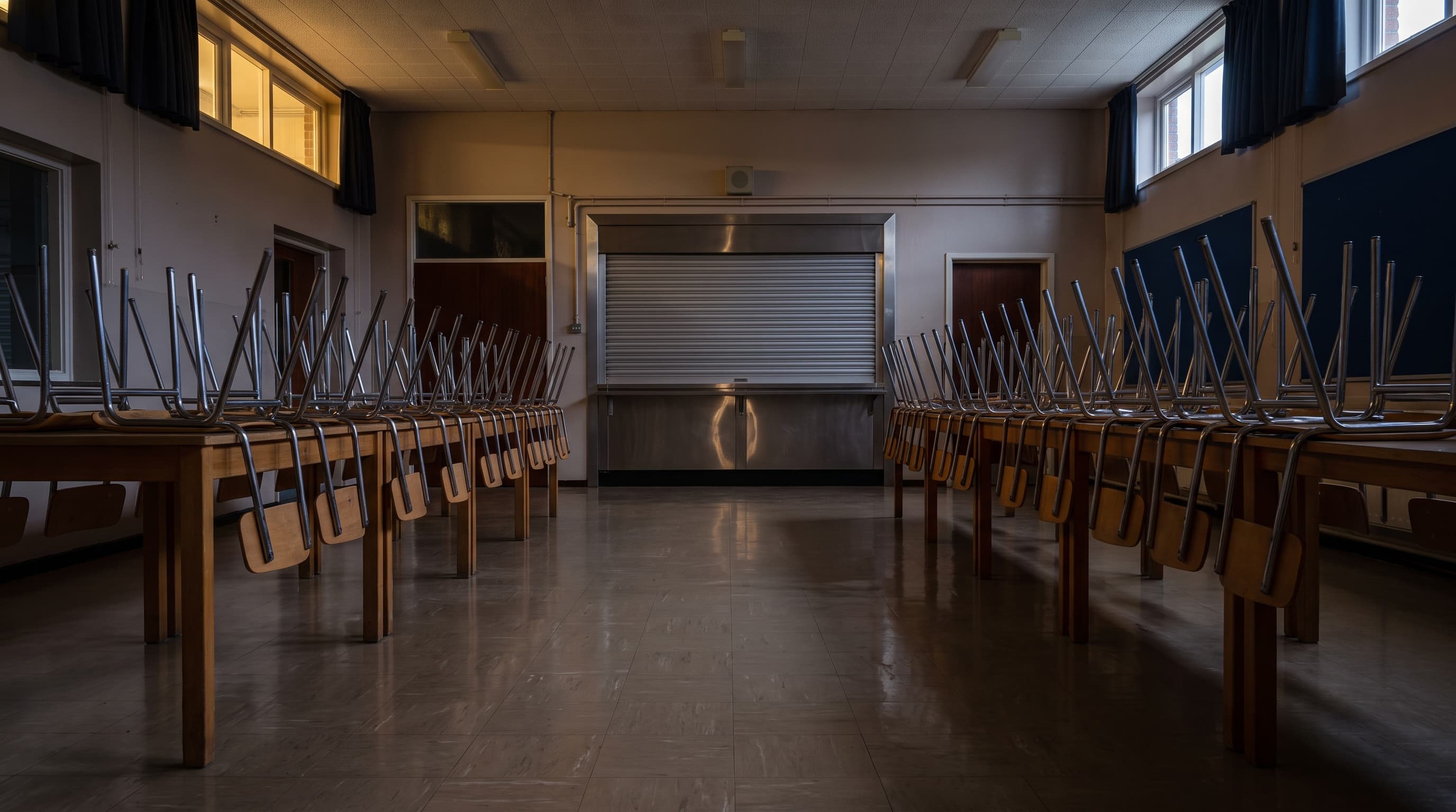 An empty school dining hall after service